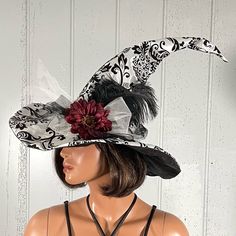 Custom Fall Black & White Witch Hat Halloween Costume Black & White Velvety Floral Fabric Crooked Hat Decorated With Burgundy Plum Flower, Black Feather & Black & White Tulle Measurements Lying Flat Approx: Circumference:21" Diameter:8" High:19" Smoke And Pet Free Home Witchy Wednesday, White Witch Hat, Halloween Costume Black, Hat Halloween Costume, Witch Hat Halloween, Witch Hats, Plum Flowers, White Witch, Flower Black