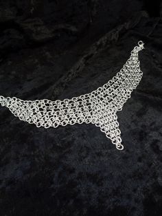 "This aluminum chainmail necklace is quite a chameleon. The length is adjustable so you can change this piece from an edgy choker to an elegant short necklace by re-positioning the clasp. The first 2 photos illustrate the transformation from a 14\" long choker (photo 1) to a 17\" long necklace (photo 2). You'll have to select your color and the necklace length (measured along the top of the necklace, including the clasp). The extension chain will be 3\". If you want it longer or shorter leave me Edgy Choker, Chainmail Choker, Chainmail Necklace, Necklace Photo, Tube Necklace, Wire Crochet, Chunky Chain Necklaces, Chain Mail, Choker Necklaces