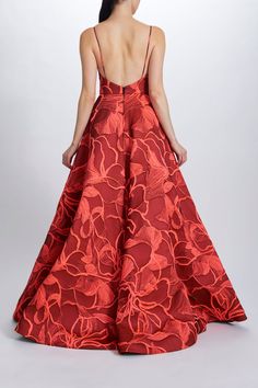 the back of a woman in a red dress