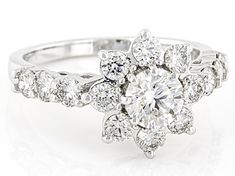 2.00ctw round white lab-grown diamond, rhodium over 14k white gold flower ring. Measures approximately 1/2"L x 1/2"W and is not sizeable. Near colorless, eye clean. White Brilliant Round Cut Flower Ring, White Flower-shaped Diamond Ring With Halo Setting, White Round Cut Flower Ring With Halo Setting, White Flower Ring With Halo Setting, White Diamond Ring With Prong Setting In Flower Shape, White Diamond Ring With Floral Prong Setting, White Flower Ring With Brilliant Cut, White Brilliant Cut Flower Ring, Gold Flower Ring