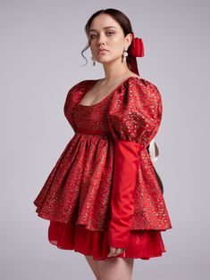 Red brocade dress with large sleeves, narrow cuffs and open neckline. The puffy skirt consists of three layers. The back closure imitates corset lacing and is tied with a bow. Limited edition Red brocade embroidered with a floral pattern Fabric: 70% viscose, 30% polyester The model is wearing size S Made in Czech Republic Red Lantern Sleeve Evening Dress, White Bishop Sleeve Dress For Party, White Puff Sleeve Dress For Party With Fitted Bodice, Party Puff Sleeve Dress With Fitted Bodice, Elegant Red Bishop Sleeve Dress, Elegant Red Dress With Bishop Sleeves, Fitted Long Sleeve Brocade Dress, Elegant Red Puff Sleeve Dress With Gathered Sleeves, Red Fitted Brocade Dress