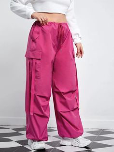 Our Flap Pocket Side Drawstring Waist Pants, you get the perfect fusion of style and comfort. Featuring flap pockets on the sides and a drawstring waist, these pants offer practicality and a modern design. The drawstring waist ensures a customized fit, while the high-quality materials provide durability and a soft feel. Whether lounging at home or going for a casual outing, these pants are a stylish choice. Details: Type: Cargo Pants Closure Type: Drawstring Waist Details: Drawstring, Pocket Wai Solid Color Straight Cargo Pants With Drawstring, Solid Straight Cargo Pants With Drawstring, Sporty Cargo Pants With Drawstring, Pink Drawstring Trousers, Trendy Pink Drawstring Pants, Long Pants With Functional Drawstring, Solid Color Drawstring Wide-leg Parachute Pants, Pink Wide Leg Pants With Drawstring, Relaxed Fit High-waisted Parachute Pants With Drawstring