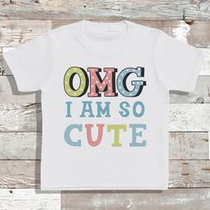 Hi All! Thank you for viewing my listing 'OMG I am so cute' baby and kids T-shirt, a lovely gift for a little one for any occasion. I have a combination of clothing products that I print on, mainly Personalised items to make your choice of clothing or gift unique! I use a combination of printing techniques on some designs from Vinyl and to printing directly onto the bodysuits. Please let me know if you have and specific designs or ideas that you may want and I'm sure I can do this for you :) Baby Vest, Baby T Shirt, Dad Birthday, Blue Design, Design T Shirt, Cute Design, Baby Tshirts, Kids Tops, Lovely Gift