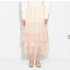 Stay Stylish With This Women's Wicked Tulle Graphic Skirt In Blush. Crafted With A Full Elastic Waistband And Midi Style, This Skirt Is Made From Lightweight Tulle Material Letting You Move Easily. The Mid Raise Adds A Touch Of Comfort, While The Loose Fit Makes It Easy To Wear Every Day. Perfect For Occasions Or Dressing Up In A Casual Outfit, This Skirt Is Both Practical And Chic. Graphic Skirt, Tulle Material, Blush Color, Women Skirts Midi, Casual Outfit, Wicked, Midi Skirt, Womens Skirt, Loose Fitting