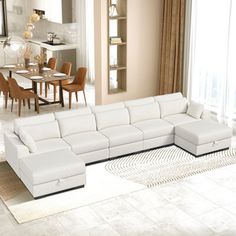 a large white sectional couch in a living room