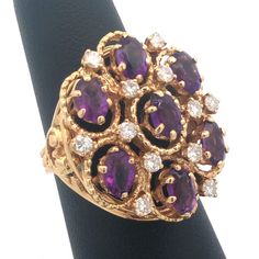 * Vintage 14K Yellow Gold Amethyst Diamond Statement Anniversary Cocktail Ring * Ring Size: 7.0 * Top of Ring measures: 1 1/8" x 1" * Height: 3/8" * Amethyst Measurements: Approximately 5.75 mm x 4.15 mm * Diamond Measurements: Approximately 2.3 mm * Diamond color: H-I * Diamond clarity: SI * Weight: 12.1 tgw * Marked: 14K Makers Mark * Condition: Great * (G117)    Exported By ExportYourStore :) Luxury Victorian Yellow Gold Amethyst Ring, High-end Vintage Amethyst Ring For Formal Occasions, Antique Gold Amethyst Ring With Multi-stone, Luxury Gold Amethyst Multi-stone Ring, Vintage 14k Gold Multi-stone Amethyst Ring, Amethyst Cocktail Ring, Diamond Color, Ring Size 7, Magpie