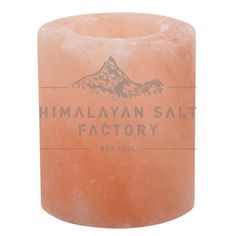 a himalayan salt factory candle is shown on a white background