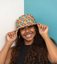 First, it protected fishermen from rain in the 1900s. Now, the personalized bucket hat is making its way to the very top of fashion picks for all ages. Choose the seam lines, add your zaniest designs and patterns on the bucket hat and make a modern wardrobe staple come to life.  .: Material: 100% polyester .: Available in 2 sizes .: Two stitching color options to pick from .: Sewn-in label .: Made in USA Retro Adjustable Hat With Curved Brim, Retro Flat Brim Hat, One Size Fits Most, Retro Adjustable Curved Brim Hat, Retro Adjustable Bucket Hat With Flat Brim, Retro Multicolor Adjustable Hats, Retro Adjustable Mini Hat With Flat Brim, Adjustable Retro Multicolor Hats, Trendy Multicolor Flat Brim Sun Hat, Retro Bucket Hat With Curved Brim