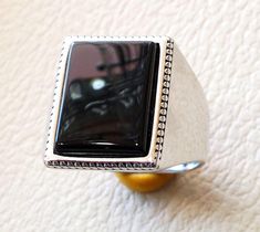 Rectangular silver aqeeq flat natural black onyx semi precious agate gemstone men ring sterling silver 925 jewelry all sizes fast shipping Risk free Quality guarantee policy : If you are not satisfied with your item for any reason simply send it to us and you will get a replacement or full refund . no risk ... no cost ... no expenses . please write or choose your size with the order and we will size it for you . Our ring is handcrafted mostly with a few simple tools . but some methods are used i Fine Jewelry With Polished Edges For Formal Occasions, Fine Jewelry With Polished Edges For Formal Events, Modern Formal Jewelry With Rectangular Stone, Formal Onyx Gemstone Rings, Formal Jewelry With Polished Rectangular Stone, Fine Silver Onyx Jewelry, Fine Jewelry With Polished Rectangular Stone, Black Ring With Polished Edges, Elegant Stone-set Signet Ring For Formal Wear