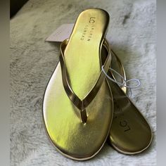 Add These Cute Sandals To Your Summer Wardrobe! Gold Flip Flop Summer Dressy/Casual Sandals Lauren Conrad Women’s/Girls Sz. 5 Save$$ And Bundle! Any Items Totaling <5lbs= Just Pay 1-Item Shipping!! Trendy Gold Flip Flops For Summer, Casual Gold Flip Flops For Spring, Gold Flat Casual Flip Flops, Casual Gold Flip Flops For Parties, Trendy Party Flip Flops For Spring, Trendy Gold Synthetic Flip Flops, Gold Trendy Synthetic Flip Flops, Chic Flat Flip Flops For Summer, Gold Flip Flops For Spring Party