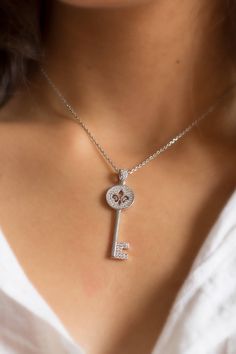 Cute key zirconium pendant, fleur de lys necklace, gift chain included French Symbol with historic meaning Perfect for birthday or anniversary gift First order with special surprise. ✨ D I M E N S I O N S✨ The diameter of the pendant is 13 mm and the total length of the pendant is 49 mm including the hook. The length of the chain is 42 cm. ✨ V A R I A T I O N S✨ We also have a circle fleur de lys pendant with zirconium on the following link: https://www.etsy.com/listing/574934823/ ✨WHAT INCLUDES French Symbols, Filigree Necklaces, Sunflower Necklace, Symbol Necklace, Key Pendant, Circle Pendant, Gold Filled Jewelry, Silver Pendant, Silver Fashion