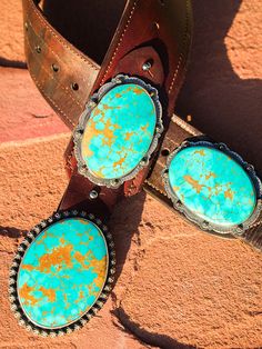 My love for old leather began when I moved out West. I search the world over, through barns saddle shops and ranches, for old retired saddle leather. This leather is the backdrop for my "Wild West" vintage leather belts! Shown here with perfect Kingman Turquoise oval concho, on 3 inch wide vintage leather. These look amazing with any of our Mas Grande Turquoise buckles. These belts sport two conchos measuring around three inches each! Buckles are sold separately. Some of this leather is over 100 Vintage Bridle Leather Belt With Antique Buckle, Southwestern Hand Tooled Leather Belt, Southwestern Hand Tooled Leather Belt Buckles, Southwestern Style Hand Tooled Leather Belt, Hand Tooled Leather Belt Buckles For Ranch, Rustic Leather Belt For Rodeo, Vintage Turquoise Belt With Concho, Vintage Hand Tooled Leather Belt Buckles, Southwestern Leather Belt Buckles For Rodeo