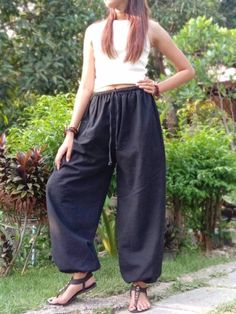 "The harem style trousers made from cotton fabric 100%with an elasticated smock waist and ankles they provide a comfortable lightweight fit, perfect for casual wear, festivals, yoga, holidays as well as pairing with a plain top to get that popular look. Materials: Cotton,Polyester Sizing: One size fits most. Size : (inches) ✿Waist 24\" (61 cm) stretching to 46\" (elastic material) (116 cm) ✿ Hip 30\"- 48\" ( 76-121 cm ) ✿ Length 40\" ( 101 cm ) ✿ Length around each legs: 10\" (25 cm) can be stre Casual Harem Yoga Pants, Casual Ankle-length Harem Pants For Loungewear, Loosely Fitted Cotton Harem Pants For Meditation, Casual Cotton Harem Yoga Pants, Casual Harem Parachute Pants For Yoga, Casual Summer Harem Parachute Pants, Cotton Hippie Harem Pants For Meditation, Hippie Cotton Harem Pants For Meditation, Casual Ankle-length Harem Yoga Pants