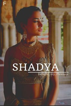 a woman in a gold outfit with the words shadya behind her