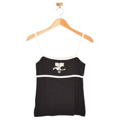 Chic Vintage Courrèges knitted vest top in a black & white monochromatic colour way with slim shoulder straps and Iconic Logo detailing. Features; Timeless Design Courreges 21 Japanese licensed label Stretchy Knitted material Sizing; Pit to Pit; 15'' - 18'' Top of shoulder to Hem; 20'' Recommended Size; UK 8-12 Vintage Courreges, Monochromatic Colour, Andre Courreges, Knitted Vest, Iconic Logo, Models Off Duty, Chic Vintage, Knit Vest, Vest Top