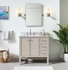 a bathroom with a sink, mirror and towel rack in it's corner next to a potted plant