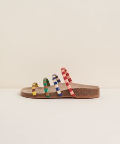 A fan favorite classic flat sandal with color. Cork and memory foam footbed, microsuede sock, and four suede or leather wrapped upper straps in multi-mismatch solids and stripes. Gloria, hallelujah. Multicolor Sandals With Rubber Sole And Flat Heel, Multicolor Flat Heel Sandals With Rubber Sole, Multicolor Leather Sandals With Cushioned Footbed, Multicolor Flat Sandals With Cushioned Footbed, Multicolor Flat Heel Sandals With Cushioned Footbed, Multicolor Flat Sandals With Rubber Sole, Multicolor Open Toe Sandals With Leather Footbed, Chic Flat Sandals With Cork-bed Midsoles, Summer T-strap Footbed Sandals With Cork-bed Midsoles