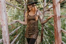 Style and Sass collide with our new Maha Mini's. These tops feature high quality custom tribal prints, ruched sides, and adjustable shoulder straps. Made of a 90% Cotton/10% Lycra blend. Bohemian Fitted Tops With Adjustable Straps, Fitted Bohemian Tops With Adjustable Straps, Brown Gold, Shoulder Straps, High Quality, Gold, Shoulder Strap