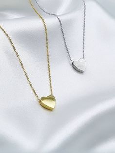 Sterling silver 925 heart necklace. Silver plated gold heart necklace. Length adjustable:42-45cm 17-18 inch. Adjustable Heart Shaped Clavicle Chain Necklaces, Trendy Sterling Silver Heart Pendant Necklace, Minimalist Adjustable Charm Necklace With Heart Pendant, Minimalist Adjustable Heart Pendant Charm Necklace, Dainty Adjustable Double Heart Necklace, Adjustable Heart Necklace With Clavicle Chain For Valentine's Day, Adjustable Minimalist Heart Pendant Charm Necklace, Minimalist Double Heart Clavicle Chain Jewelry, Dainty Double Heart Adjustable Necklace