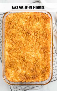 a casserole dish on a cooling rack with a fork