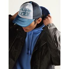 Acne Studios' cap is inspired by early '00s trucker styles. It's made from panels of mesh and satin-jersey that's flocked with a fisheye take on the brand's logo. Streetwear Trucker Baseball Cap, Blue Trucker Hat With Curved Bill For Streetwear, Retro Blue Trucker Hat For Streetwear, Blue Retro Trucker Hat For Streetwear, Retro Blue Baseball Cap For Streetwear, Blue Retro Baseball Cap For Streetwear, Blue Trucker-style Six-panel Baseball Cap, Blue Six-panel Trucker Hat, Blue Trucker Hat With Embroidered Logo For Streetwear