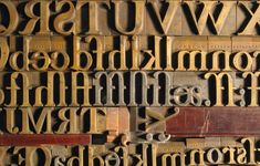 the letters are made from old wood typewriters