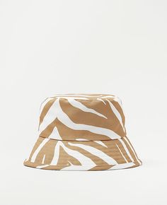 Elevate your weekend style with the Ann Taylor Weekend Zebra Print Bucket Hat. This chic accessory is perfect for adding a playful touch to your casual ensembles.

- Size: S/M
- Color: White
- Material: 100% Polyester
- Gender: Female
- Age Group: Adult

Designed with a bold zebra print, this hat is crafted from lightweight polyester, ensuring comfort and durability. The relaxed fit and easy pairing options make it a versatile addition to your wardrobe, ideal for those laid-back days or outdoor Bucket Hat White, Hats Fashion, Style Steal, Getting Dressed, Women's Hats, Weekend Style, Chic Accessories, Petite Fashion, White Summer