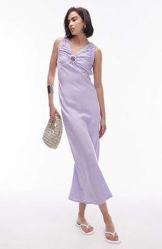 Look gorgeous at brunch in this lilac midi dress cut from lightweight cotton and topped with a keyhole cutout at the neckline. Slips on over head V-neck Sleeveless 100% cotton Machine wash, line dry Imported Lilac Midi Dress, Cocktail Dress Formal, Cotton Midi Dress, Long Sleeve Floral Dress, Satin Slip Dress, Maxi Dress Trend, Dress Cuts, Hoodies For Sale, Prom Party Dresses