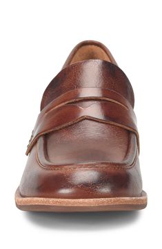 A classic penny keeper and squared-off moc toe add timeless sophistication to a loafer-inspired pump lifted by a stacked block heel. 1 1/2" heel Cushioned footbed Leather upper/textile lining/rubber sole Imported Classic Slip-ons With Square Toe And Rubber Sole, Classic Slip-ons With Leather Footbed, Medium Width, Classic Leather Platform Loafers Medium Width, Classic Brown Platform Loafers With Removable Insole, Classic Leather Moc Toe Platform Loafers, Classic Leather Loafers Medium Width, Classic Medium Width Loafers, Classic Slip-ons With Rubber Sole And Square Toe, Classic Platform Loafers With Square Toe And Rubber Sole