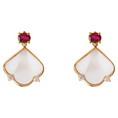 Rossella Ugolini Design Collection, Deco Style 18 Karats Yellow Gold Oval Cut Rubelite, Rock Crystal, 0.12 Carats White Diamonds Dangle Earrings. Dimension: inches 0.39 x 6.29. cm. 1x1.6. gr 4. These Art Deco style dangle earrings are a stunning piece of jewelry from the Rossella Ugolini collection. Handcrafted in Italy, these earrings are made from 18k yellow gold and feature a beautiful combination of Rubelite, white Diamonds, and Rock Crystal. The frosted fan shape of the earrings gives them a unique, eye-catching look that is sure to turn heads. The Art Deco style is characterized by its bold, geometric designs and clean lines, making these earrings a timeless piece of jewelry that will never go out of style. The use of precious materials such as 18k yellow gold, Rubelite, White Diamon Diamond Dangle Earrings, Crystal Dangle Earrings, Design Collection, Rock Crystal, White Diamonds, Geometric Designs, Pendant Set, High Quality Jewelry, Deco Style