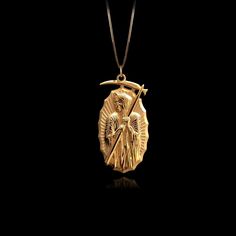 Our Gold Santa Muerte Pendant, crafted in the USA from real solid gold, embodies devotion and protection. This timeless piece showcases exquisite craftsmanship, designed to last a lifetime. Perfect for those seeking a unique and meaningful symbol, this pendant is a testament to enduring quality and elegance. PENDANT INFORMATIONThis pendant is made of real, solid gold.• Made in USA• Material: 14k or 18k solid gold• Finish: polished• Height: 1.28" (32,5 mm) x Width: 0.65" (16,5 mm)• Pendant weight Phoenix Pendant, Solid Gold Chains, Mini Pendants, Dragon Pendant, Yellow Gold Chain, Yellow Gold Pendants, Memento Mori, Elegant Jewelry, Gold Finish