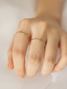 Don't wear your heart on your sleeve - wear it on your finger, shh..it's our little secret. Our Teeny Tiny Heart Ring is handcrafted in solid 14K gold in 1.15 mm width, lightweight and durable. Simple Gold Stackable Rings For Promise, 14k Gold Heart Ring With Single Diamond For Gift, 14k Gold Heart Ring With Single Diamond For Promise, Everyday Rings With Single Diamond In Recycled Gold, Everyday Recycled Gold Ring With Single Diamond, Everyday Ring With Single Diamond In Recycled Gold, Dainty Gold Heart Ring For Everyday, Everyday 14k Gold Heart Stackable Rings, 14k Gold Heart Ring With Single Diamond