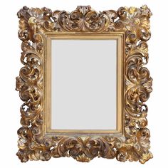 an ornate gold framed mirror on a white background