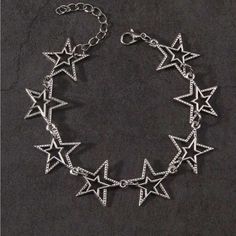 Vintage Punk Star Charm Bracelet Color: Silver Product Measurement Length:8.1-10 Inch Metal Star-shaped Bracelets, Silver Alloy Bracelets For Festival, Edgy Silver Star-shaped Jewelry, Silver Grunge Bracelets For Festival, Grunge Style Silver Bracelet For Festival, Edgy Adjustable Star-shaped Jewelry, Silver Metal Grunge Bracelets, Adjustable Star-shaped Edgy Jewelry, Adjustable Edgy Star-shaped Jewelry