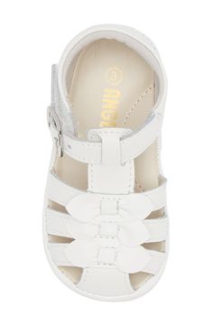 Your little one will love stepping out in this soft leather fisherman sandal topped with a dainty bow and outfitted with an arch-supporting footbed. Adjustable hook-and-loop strap Leather upper and lining/rubber sole Imported White Closed Toe Sandals With Bow, White Bow Sandals For Spring, White Sandals With Bow And Round Toe, White Sandals With Soft Sole For Spring, White Synthetic Sandals With Soft Sole, Bow Sandals, Stepping Out, Little One, Soft Leather