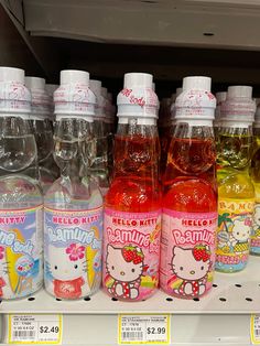 hello kitty drinks are on display in a store