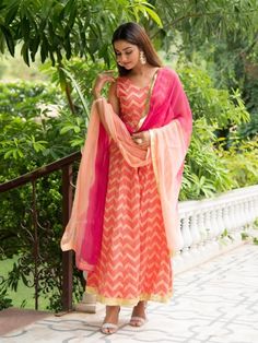 Set of 2 consists of kalidaar and dupatta. Painting you in the colors of the festive season with this shaded peach lehriya kalidaar Kurta: A stunning hand-printed lehriya kalidaar is mesmerizing shades of peach & red with delicate gota detailing Dupatta: A peach ombre shaded dupatta with gota lappa work Fit: Fitted at bust. Flared up to ankle Wash Care Instructions: Dry Clean Only Note: Bottom not included Available in other colors The product will be shipped within 15-20 days of the order p