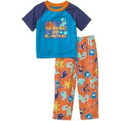 Keep your little one comfortable from day to night in this toddler boys' two-piece sleepwear set from Peas & Carrots. A short-sleeve tee and a matching pair of pajama pants are included in the set. The T-shirt has a stylish graphic on the front and a tag-free inner for a smooth feel on his skin, while the pants have a colorful pattern printed all over and a hassle-free covered elastic waistband. This toddlers' pajama set is great for sleeping and lounging around the house. Peas & Carrots Toddler Pants Short, Free Cover, Sleepwear Sets, Baby & Toddler Clothing, Toddler Boys, Peas, Baby Accessories, Color Patterns, Pajama Set