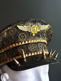 Our captain hat boasts an authentic steampunk aesthetic. Intricate gears, cogs, and spike elements adorn the hat, transporting you to an era of innovation and daring feats.


Age Group/Gender - Adult/Unisex

Size/Type - One size fits all adults

Mask Color - Gold Steampunk High Crown Mini Hat For Themed Events, Vintage High Crown Costume Hats For Cosplay, Steampunk Top Hat With High Crown For Themed Events, Steampunk High Crown Hat For Themed Events, Steampunk Brimmed Costume Hats For Themed Events, Steampunk Brimmed Costume Hat For Cosplay, Steampunk Hat For Themed Events, Steampunk Brimmed Hat For Themed Events, Vintage High Crown Costume Hats For Themed Events