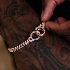 Step up your game with the Iced Handcuff Diamond Prong Cuban Bracelet, now in 14k Rose Gold! This piece features an iced out Cuban chain connecting two pave handcuffs, each accented with our signature GLD star. Designed to elevate your look in an instant, pair it with the matching chain for the perfect set. This product is guaranteed for life – GLD will repair or replace the item should you experience any defects in craftsmanship or breakage. Specifications - Width: 6mm - Length: 6", 7", 8", & 9 Cuban Bracelet, Vermeil Jewelry, Custom Earrings, Cuban Chain, Pendant Bracelet, Drop Necklace, Elevate Your Look, Chain Pendants, Chains Jewelry