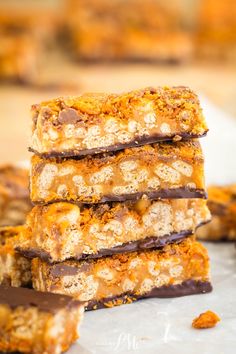 five pieces of chocolate and caramel bars stacked on top of each other