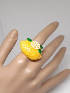 I am going grapes over this ring made with resin grapes charm and silver or gold tone materials. Be sure to check out my other items too. Green Novelty Resin Jewelry, Handmade Novelty Resin Jewelry, Cute Yellow Resin Jewelry, Fun Yellow Nickel-free Jewelry, Cute Fruit Design Jewelry For Gifts, Cute Fruit Design Jewelry As Gift, Adjustable Fun Fruit Design Jewelry, Yellow Resin Jewelry For Gifts, Yellow Resin Jewelry Gift