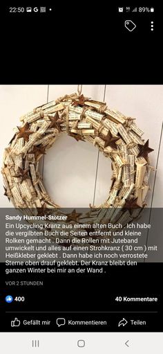 a close up of a wreath on a wall with words written in german and english