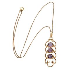 This necklace and pendant are made out of 14 karat gold and three amethysts. The three amethysts have a light purple color and they are surrounded by golden arches. The necklace is perfect for any social event as well as for the everyday wardrobe. Sold without chain, just a pendant but a really nice one. Light Purple Color, Social Event, Amethyst Gold, Everyday Wardrobe, Light Purple, Purple Color, Chains Necklace, Jewelry Necklace Pendant, Really Cool Stuff