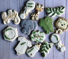 some decorated cookies are laying on a table