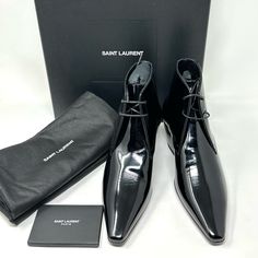 Saint Laurent Patent Leather Lace-Up Ankle Boots These Super-Chic Lace Up Boots Are Beautifully Crafted Of Patent Leather In Black And Feature A Pointed Toe And And A Tapered Stacked Heel. Patent Leather Size: 37 Made In Italy Comes With Box And Dust Bags Designer Patent Leather Boots With Almond Toe, Luxury Patent Leather Boots With Almond Toe, Luxury Patent Leather Boots For Formal Occasions, Designer Patent Leather Boots For Office, Luxury Patent Leather Evening Boots, Luxury Patent Leather Boots For Evening, Designer Patent Leather Pointed Toe Boots, Designer Patent Leather Boots With Pointed Toe, Designer Patent Leather Business Boots