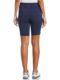 These Callaway women's golf shorts deliver on-course comfort and style with every swing. Stretch in the fabric allows you to move with ease, and a TrueSculpt™ panel helps create a smooth and flattering silhouette. Opti-Dri™ moisture-wicking technology pulls away sweat to keep you cool and dry as you play. The textured fabric of these golf shorts contains LENZING™ EcoVero™ viscose fibers derived from sustainable wood and pulp, for an eco-friendly wardrobe choice you can feel good about. 75% Ecove Fitted Golf Shorts For Spring, Stretch Golf Bottoms Short Length, Stretch Golf Shorts, Casual Fitted Golf Shorts, Blue Fitted Bermuda Shorts With Short Inseam, Fitted Blue Bermuda Shorts With Short Inseam, Blue Bermuda Shorts For Work, Stretch Bermuda Shorts For Work, Stretch Bermuda Shorts For Work With Short Inseam