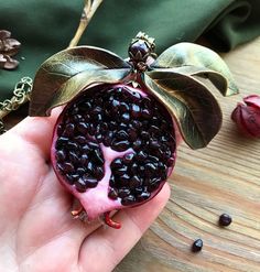 "This necklace already sold but I can make very similar (not 100% same) for your order. If you need longer chain please write it in comment to order) Statement juicy pomegranate pendant with leaves. Pomegranate seeds - natural garnet. skin and leaves - polymer clay. the bead at the top of the pendant is garnet. Garnet pomegranate ) Garnet - January birthstone Diameter of pomegranate 5cm (1.96\") Chain 48cm (19\")" Garnet Pomegranate, Persephone Costume, Pomegranate Pendant, Red Garnet Jewelry, Pomegranate Necklace, Food Fruit, Pomegranate Seeds, Garnet Jewelry, Art Food