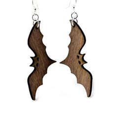 the wooden earrings are shaped like bats