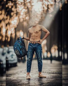 a man with no shirt is holding a backpack